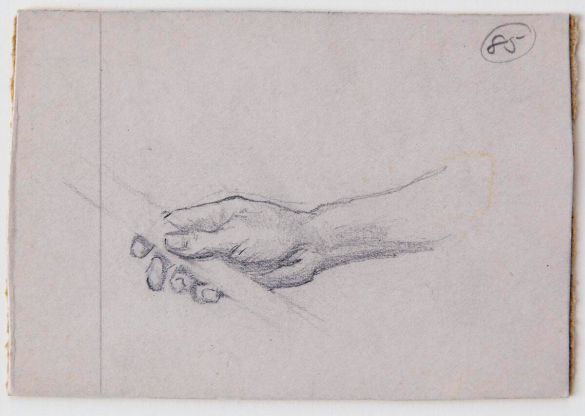 Hand Holding a Rod